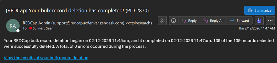 Screenshot of the Outlook user interface, displaying an email (detailed in the text above) confirming the background bulk record delete process has been completed.